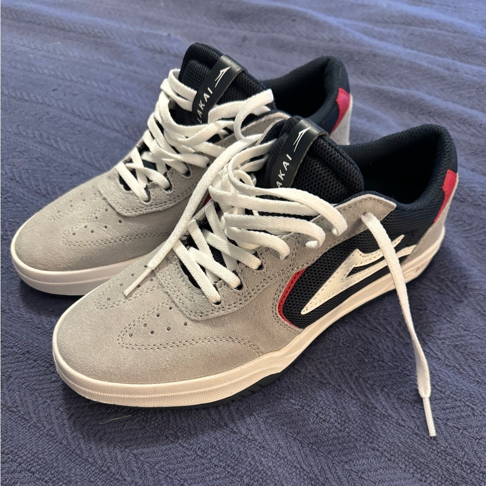 Lakai men’s size 6.5. Gray, red, blue, and white. Only worn once.